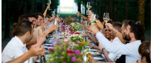 An outdoor banquet dinner highlighting a memorable wedding guest experience
