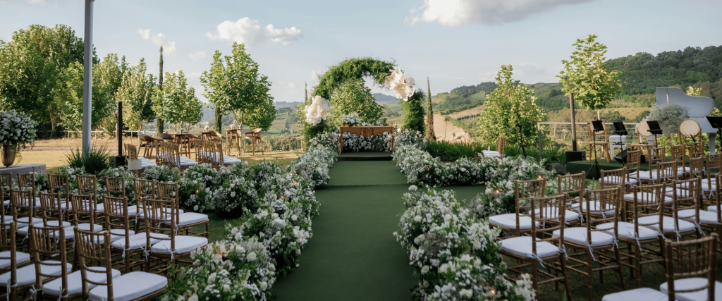 Garden Wedding Venues in Singapore with elegant outdoor ceremony setup, floral aisle and arch decor